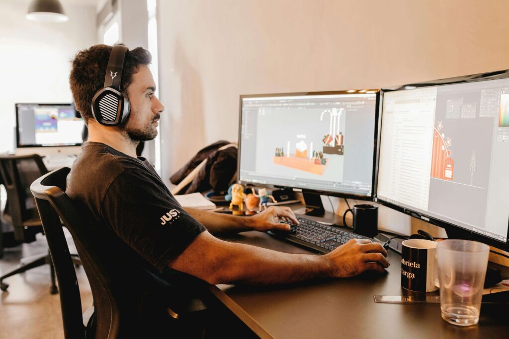 Man in the workspace listening to the music